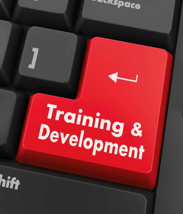 a keyboard with training and development on the keys